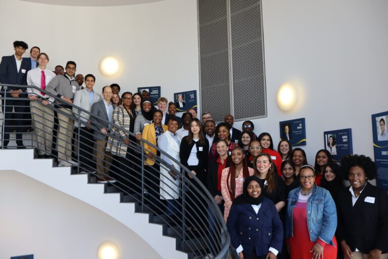 Group photo of the 2025 Georgia Youth Leadership Award winners and their coaches, taken Feb. 1, 2025 at their Meet & Greet luncheon in at Emory's Goizueta Business School.